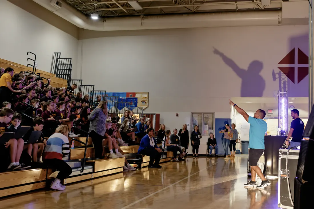 Get Schooled Tour assembly in a school gym